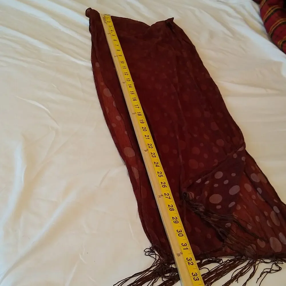 Brown polka dot women's scarf with fringe.
